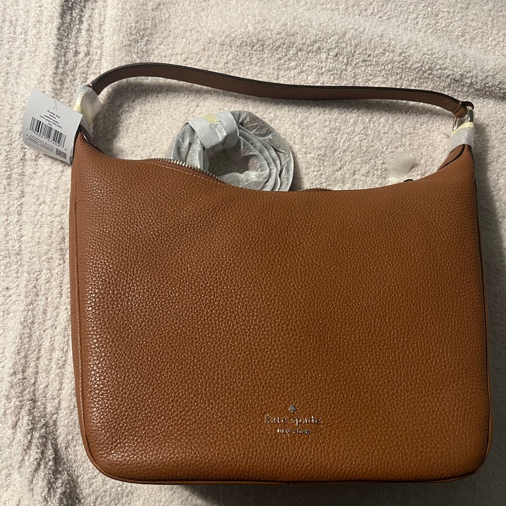 Kate Spade shoulder bag with crossbody strap. New with tags.